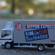 Illustration for article titled Land of the Rising Sun-Day: Tomica Limited Vintage Neo Nissan Atlas Panel Van